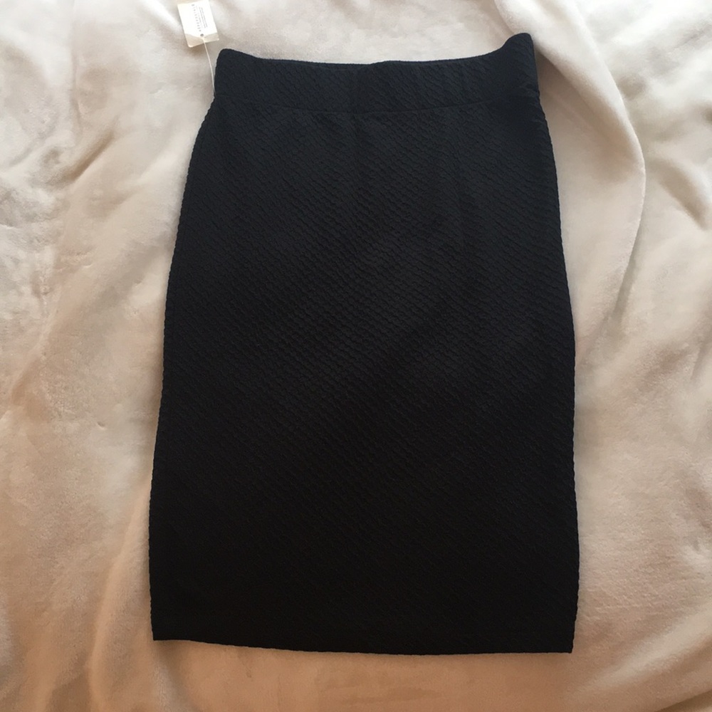 never worn, stretchy, ribbed, black pencil skirt
